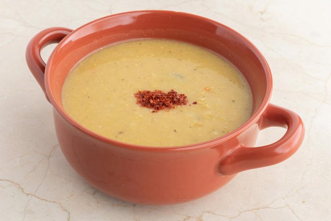 Fufu ghanese tradizionale con zuppa piccante